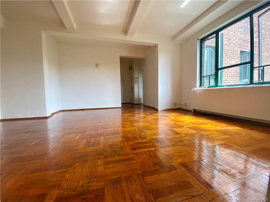 Living room with parquet floor throughout