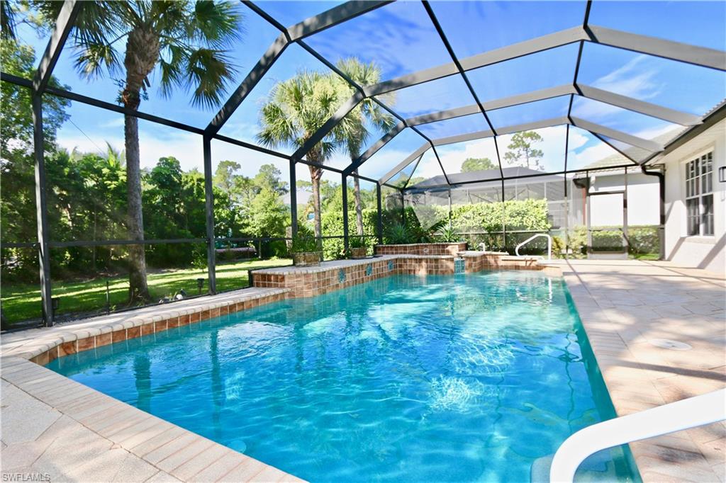 a view of a swimming pool with a porch