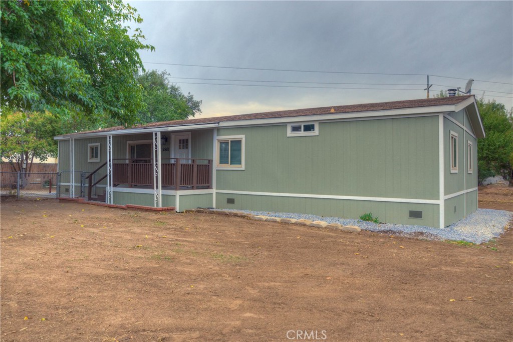 a view of backyard and deck