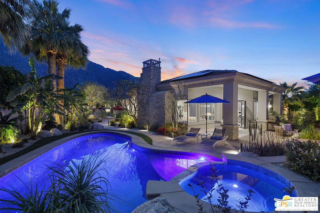 a view of swimming pool with a patio