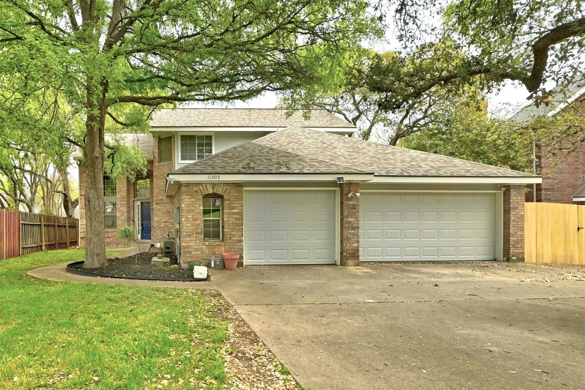 Massive circular driveway with parking for 5-6 cars plus your 3 car garage.