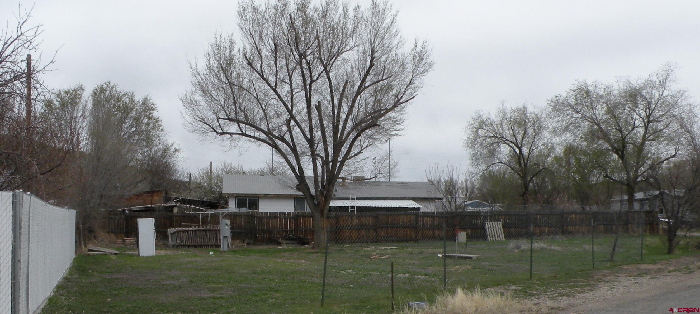 a view of house with outdoor space