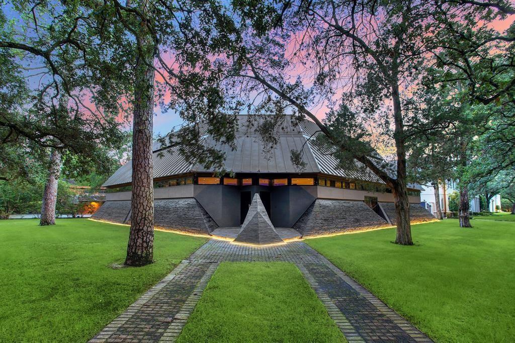 Welcome to "The Darth Vader House" located on the corner of one of the most prestigous lots in Houston.