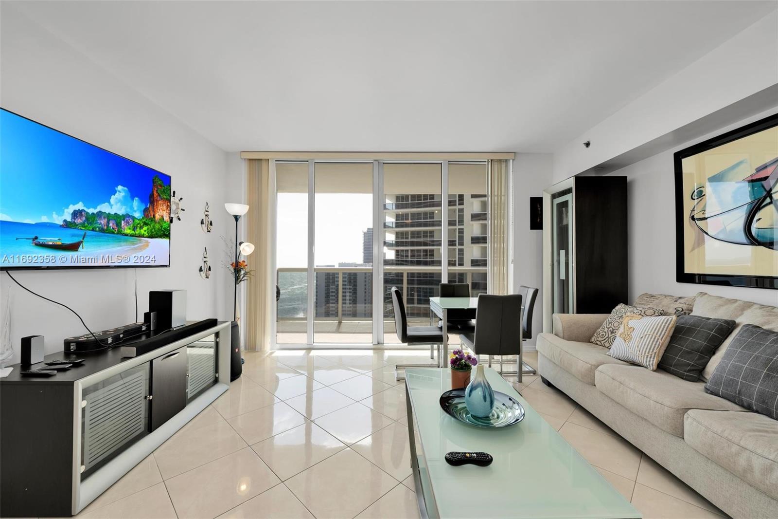 a living room with fireplace furniture and a flat screen tv