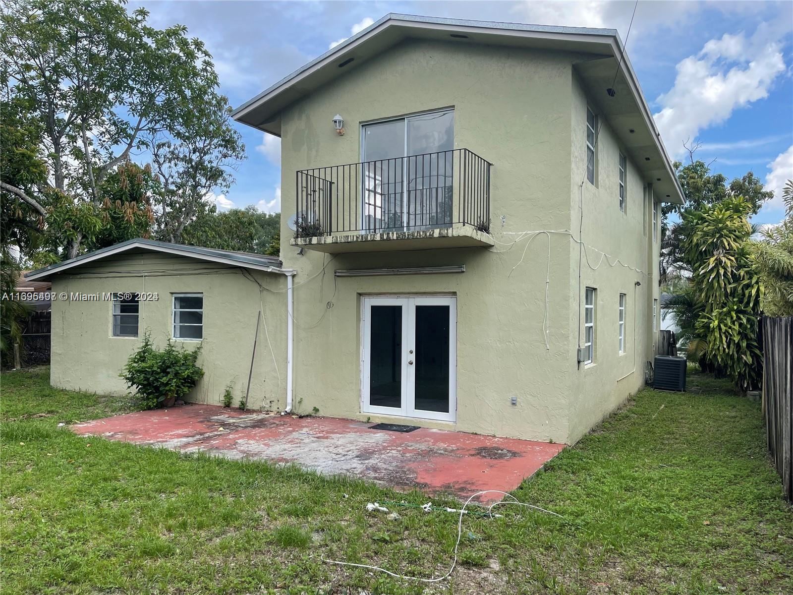 a front view of house with yard