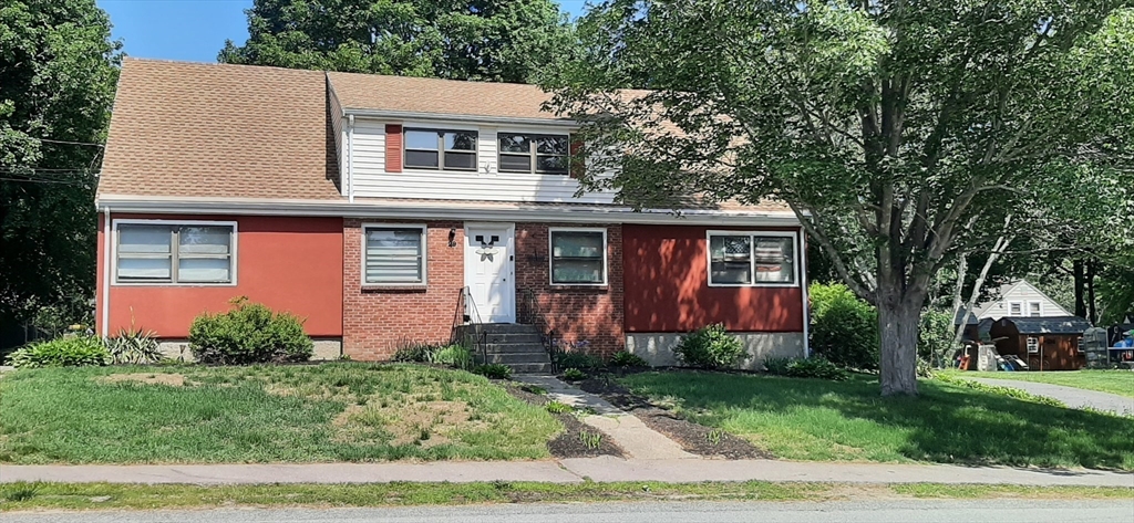 front view of house with a yard