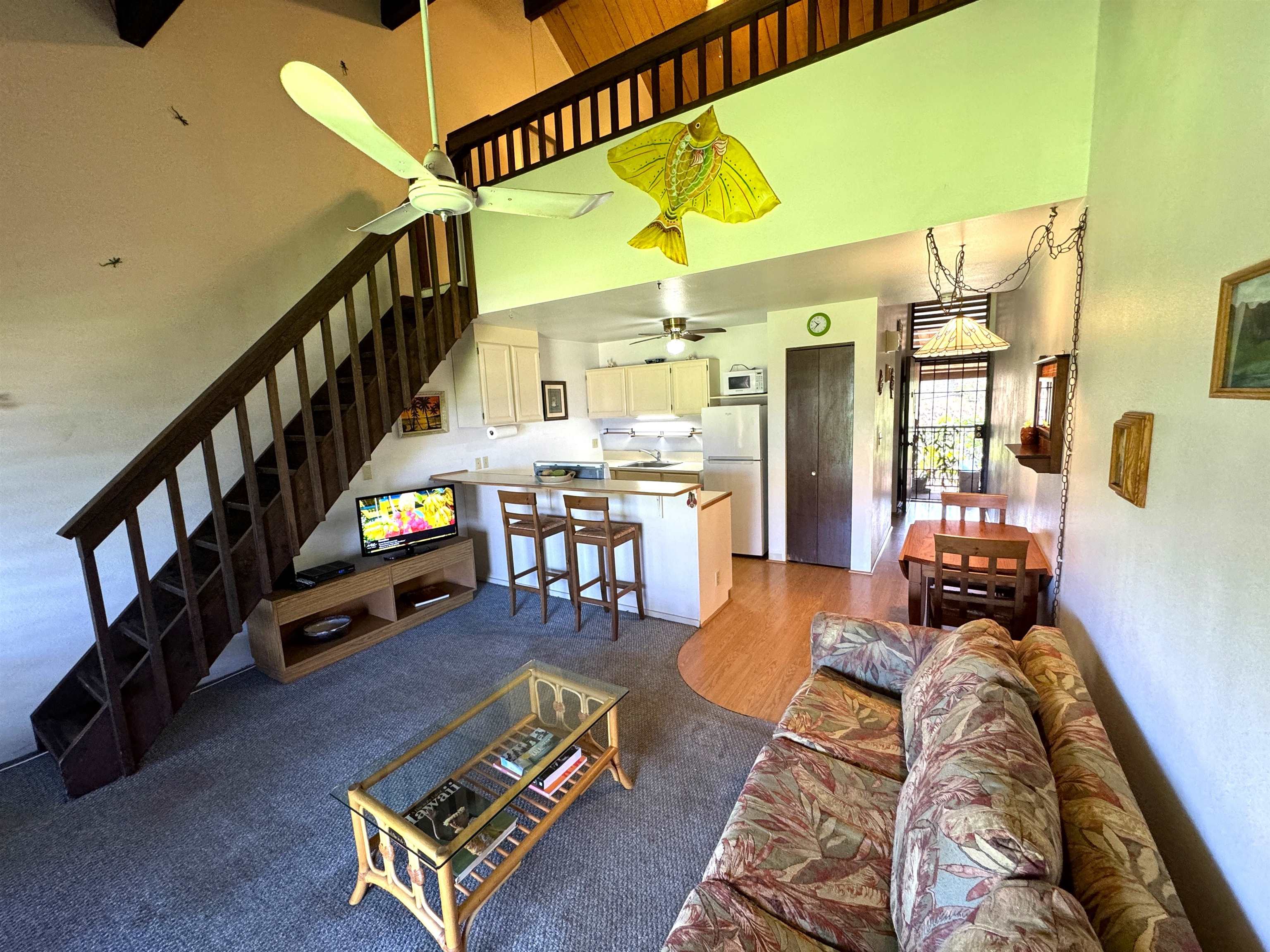 a living room with furniture and a table