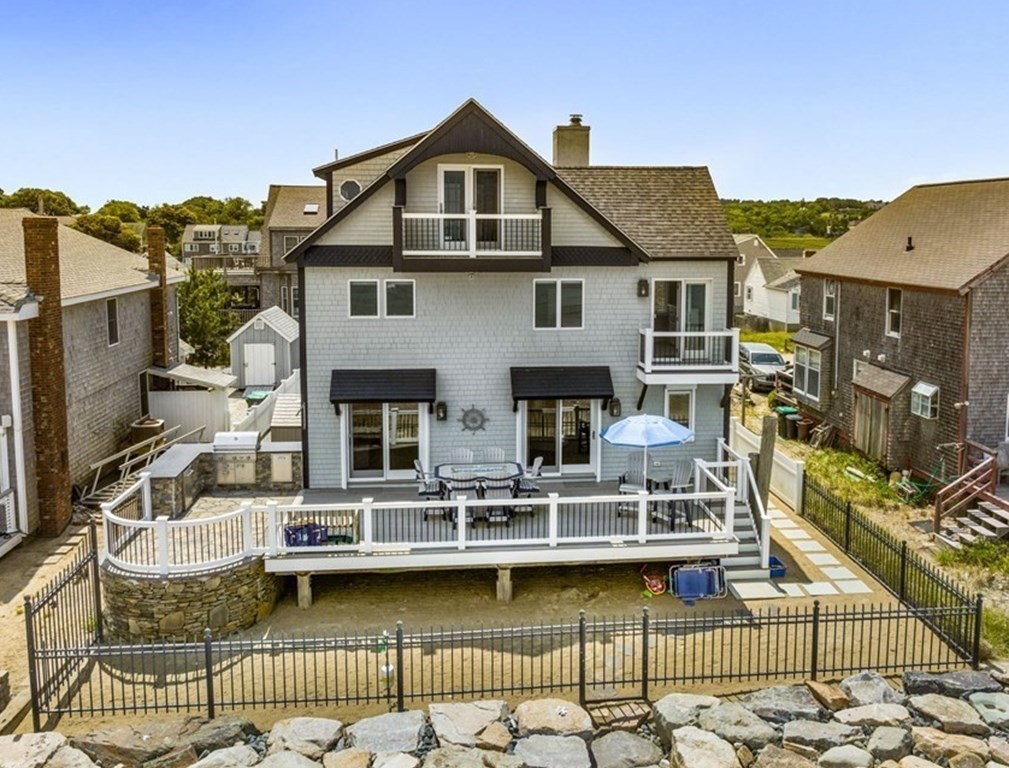 a front view of a house with swimming pool