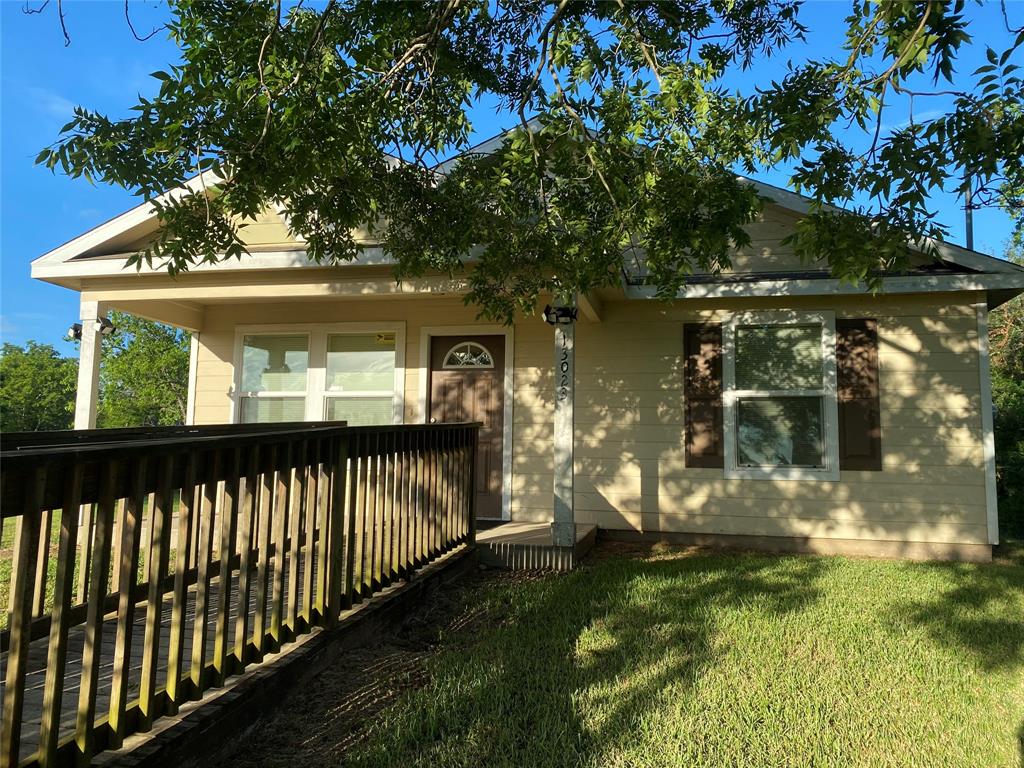 a view of a porch with a yard