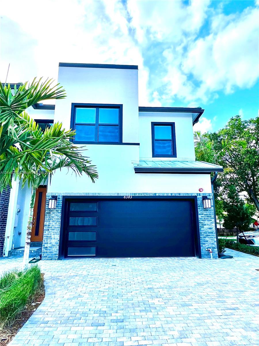 a house view with a outdoor space