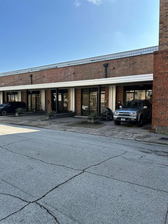 front view of building with cars