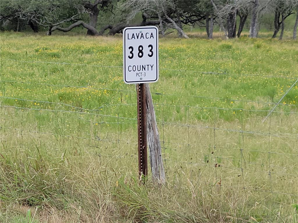 a sign board with river in front of it