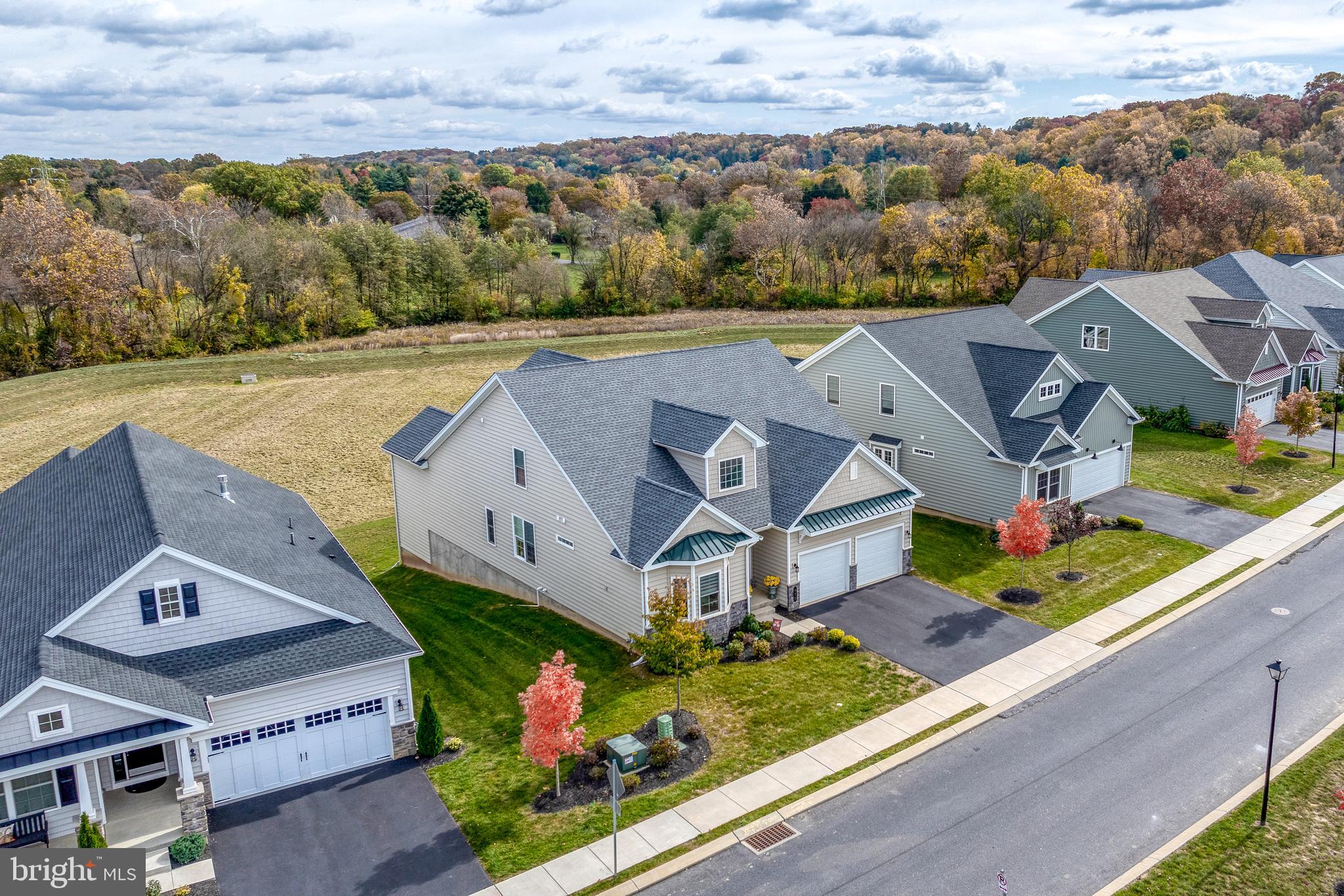 an aerial view of a house with a garden