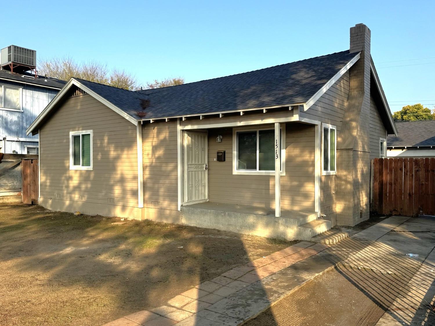 a view of a house with a patio