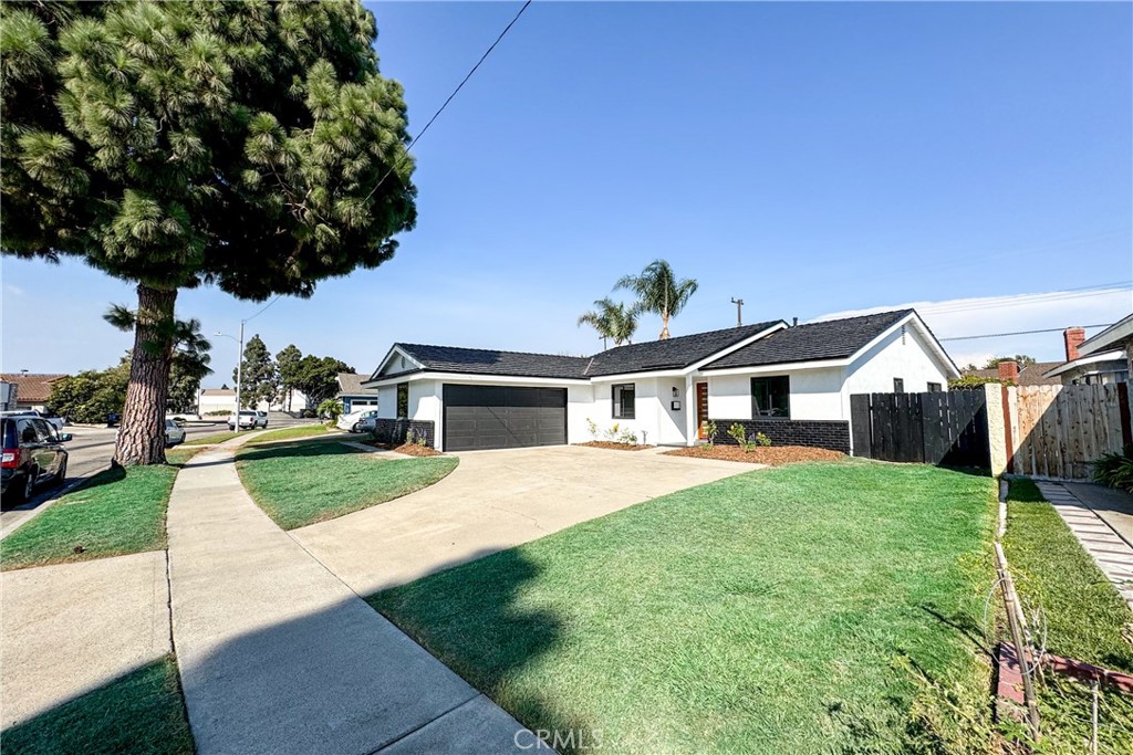 a front view of a house with yard