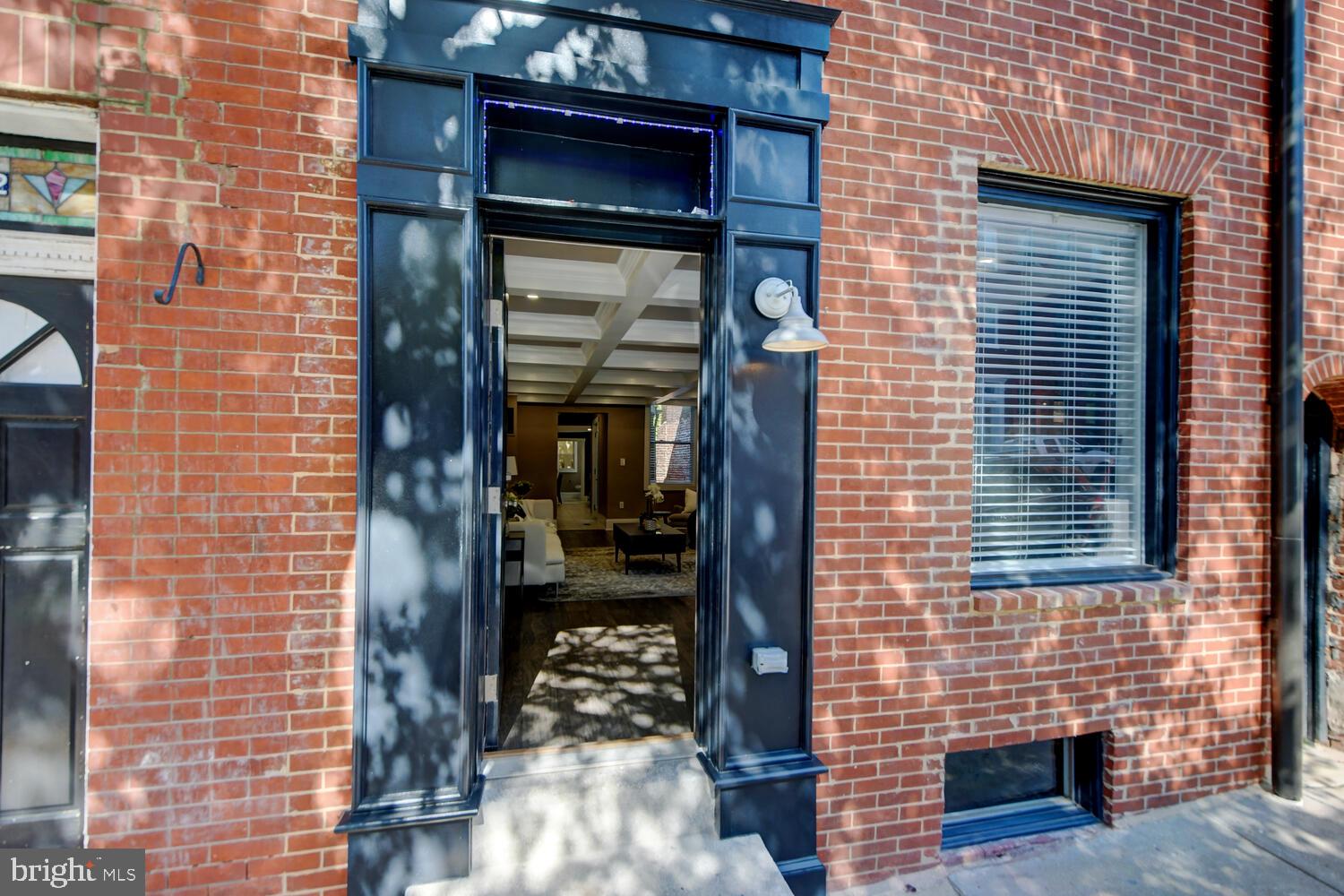 a brick house with a door and a window