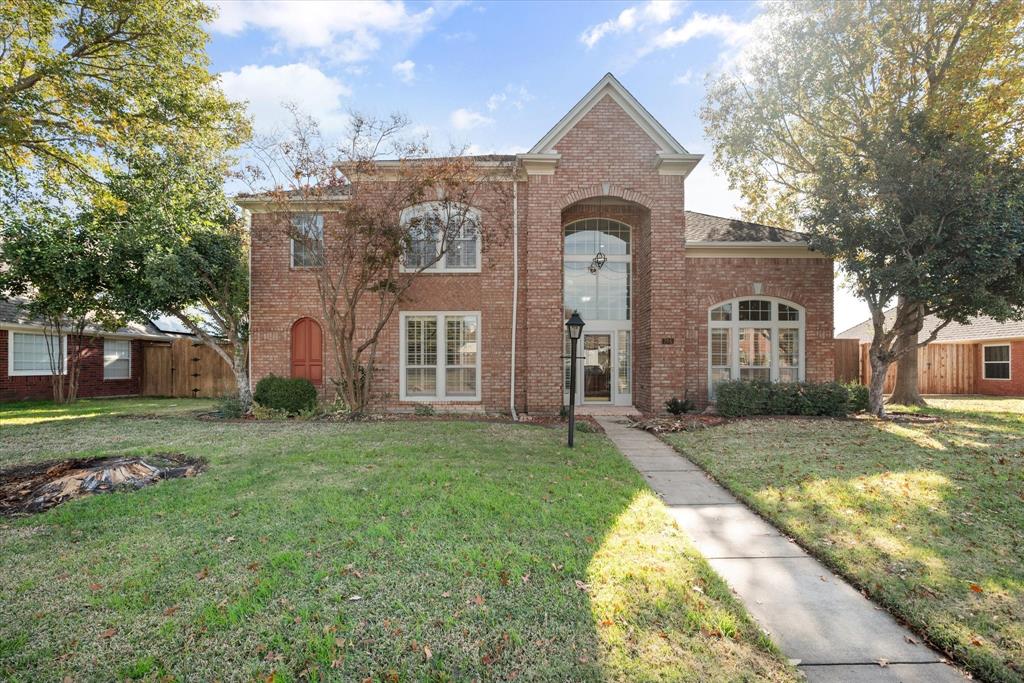 View of front of house with a front yard