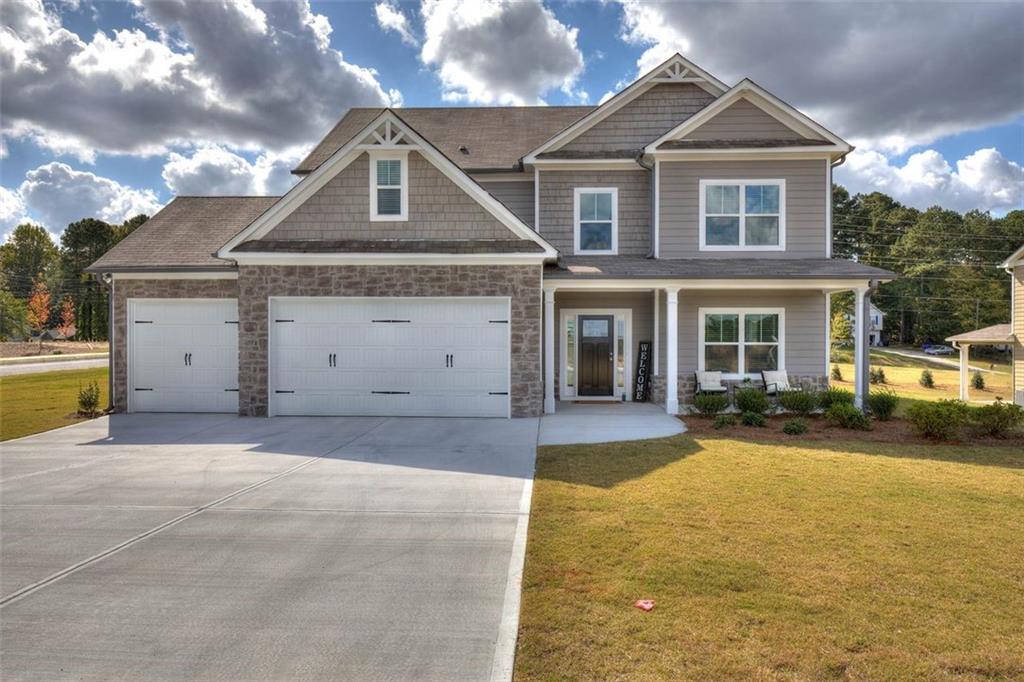 front view of a house with a yard