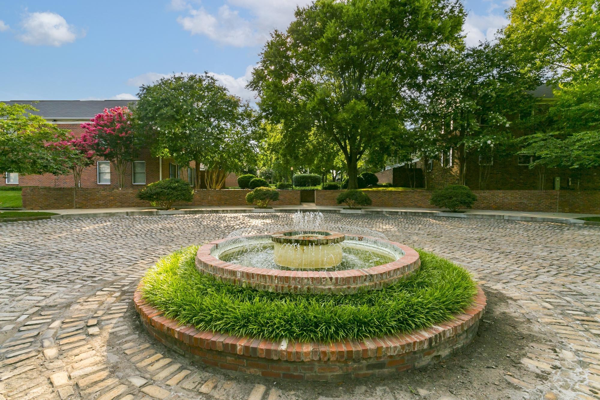 a view of a swimming pool with a house in the background