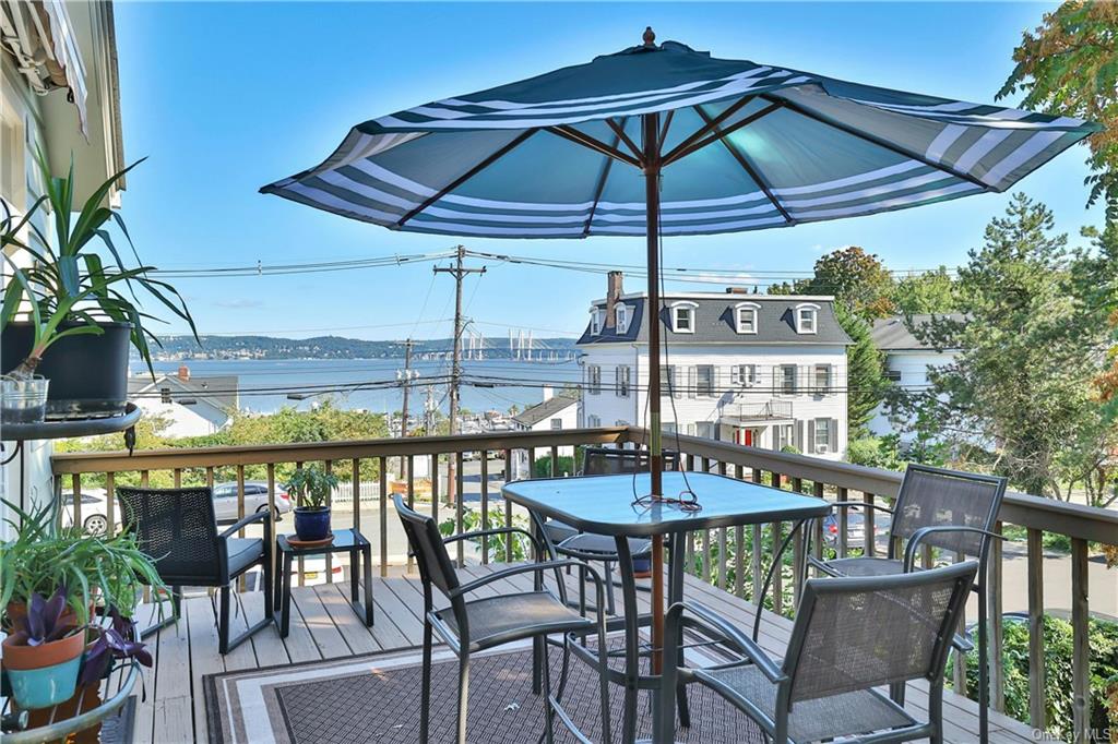 View of the Hudson River harbor, and GMC/TZ Bridge from the expansive deck