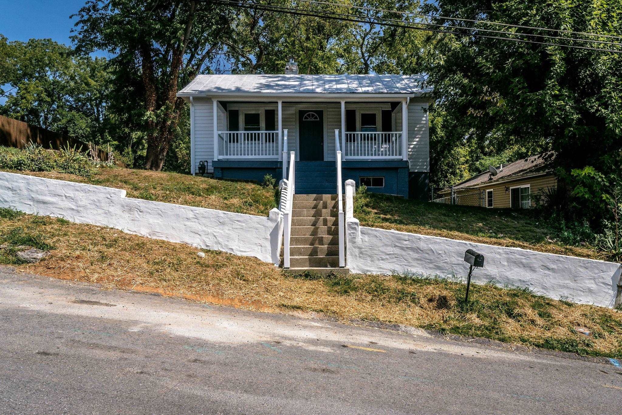 a front view of house with yard