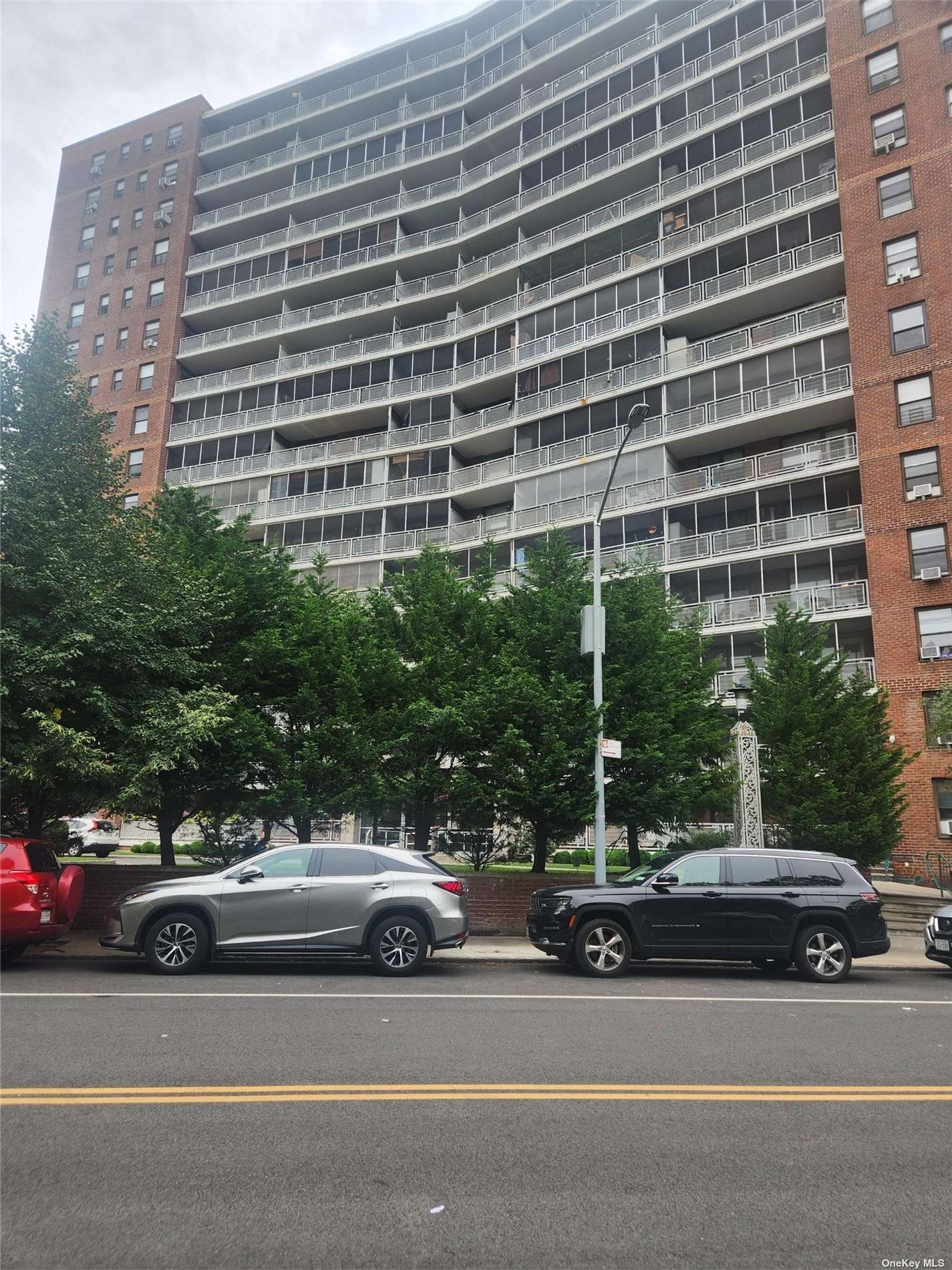 a view of a cars parked in front of a building