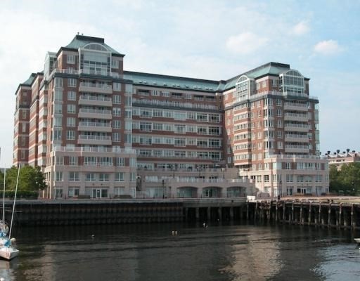 a view of a large building with a lake view