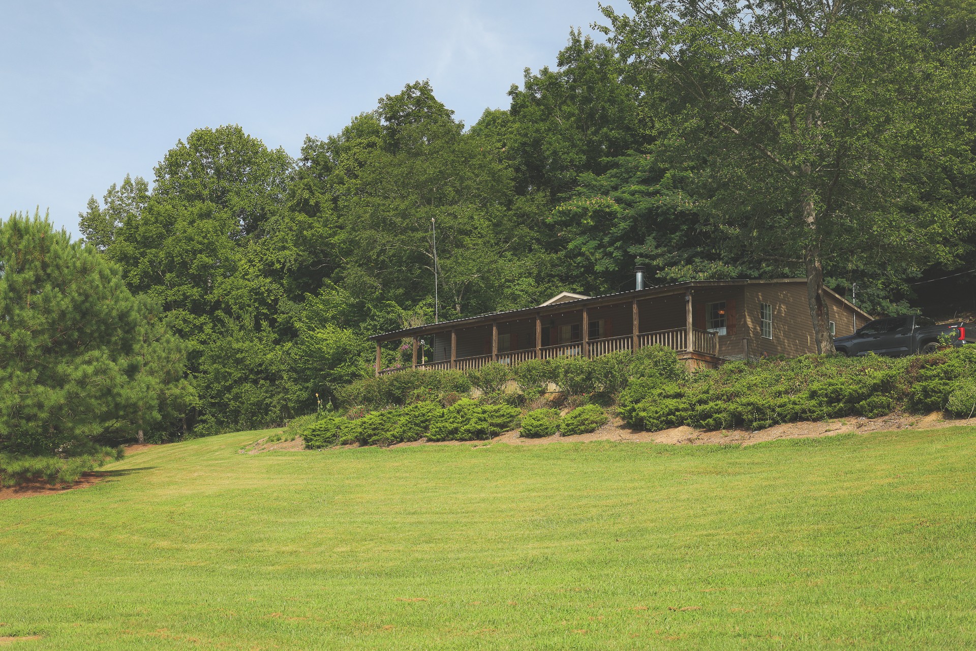 a front view of a house with a yard