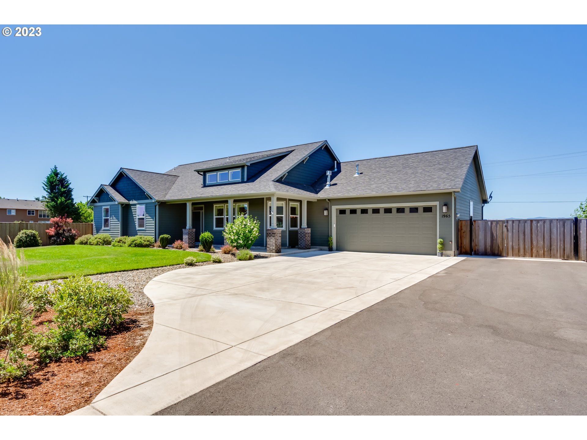 a house with yard in front of it