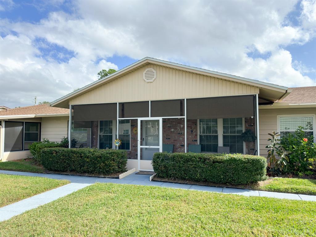 front view of a house and a yard