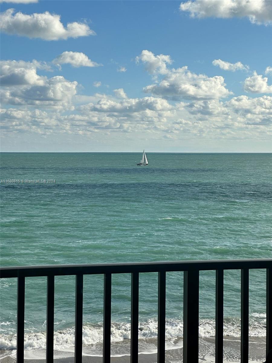 a view of ocean from a balcony