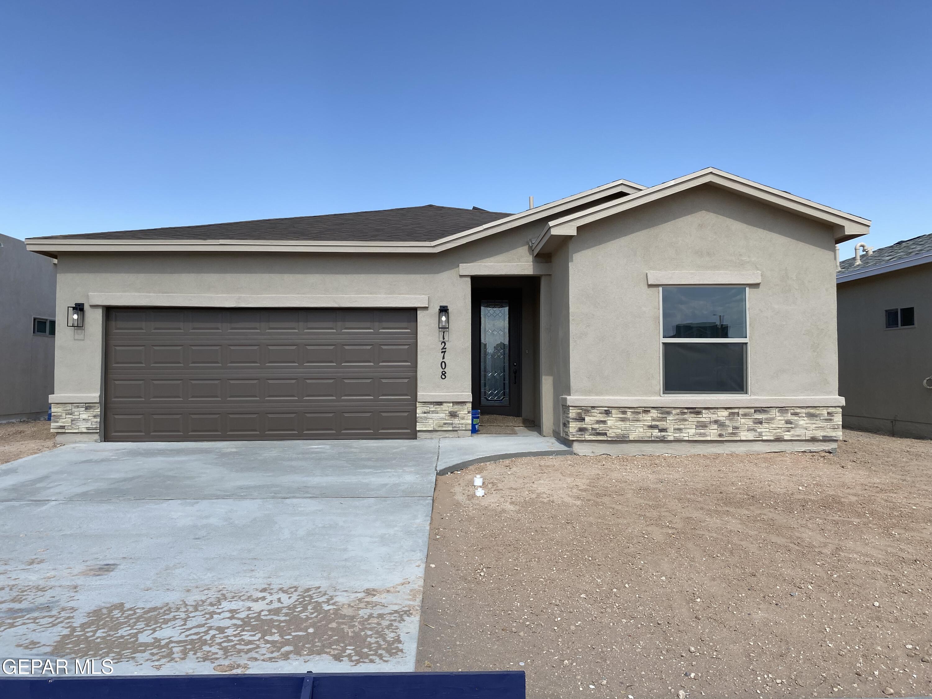 a view of a house with a garage