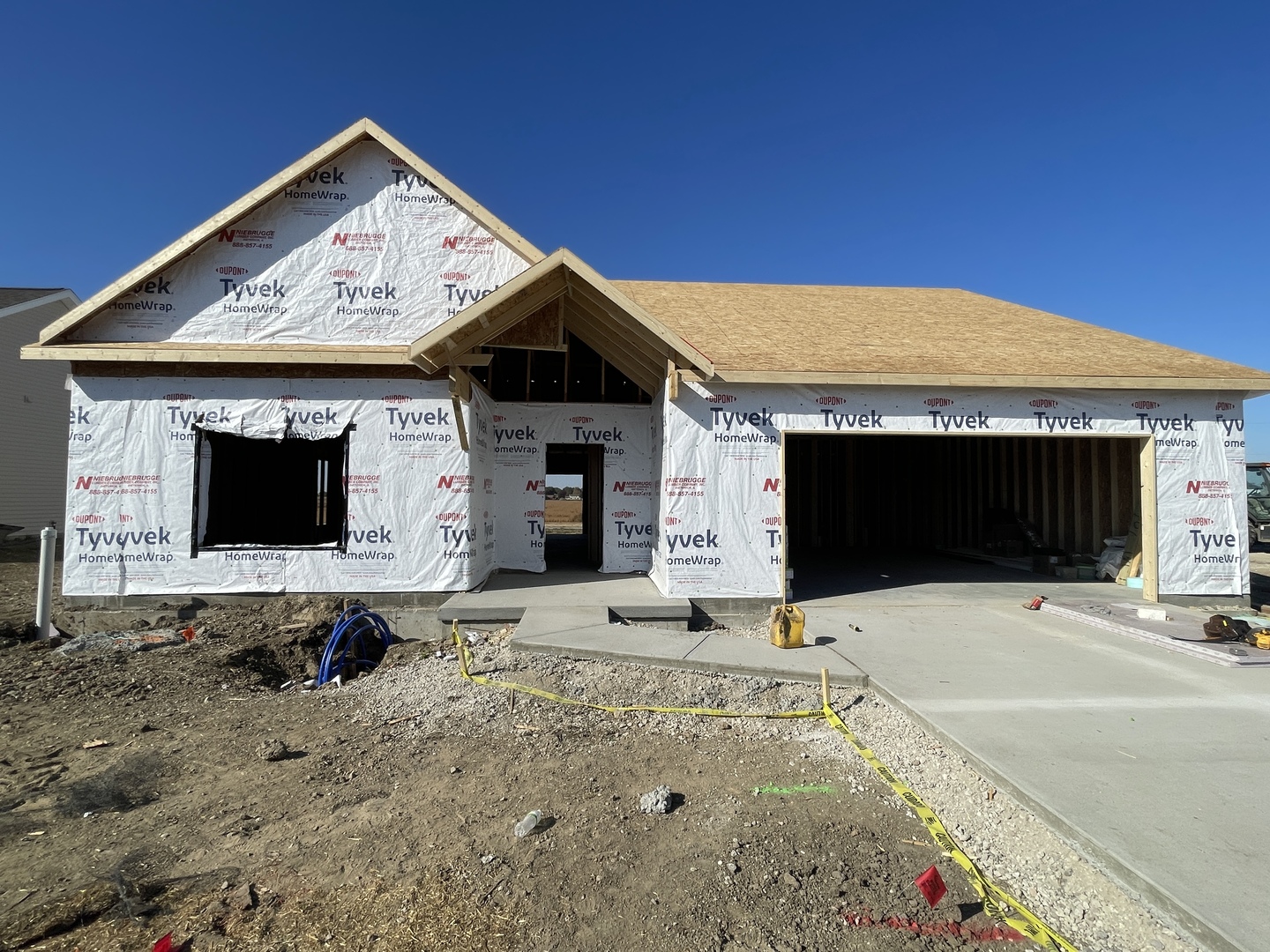 a front view of a house with parking