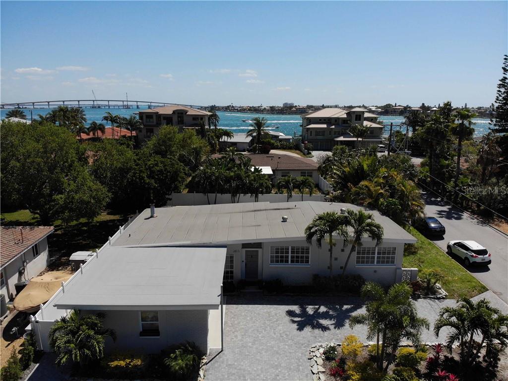 an aerial view of a house with a garden