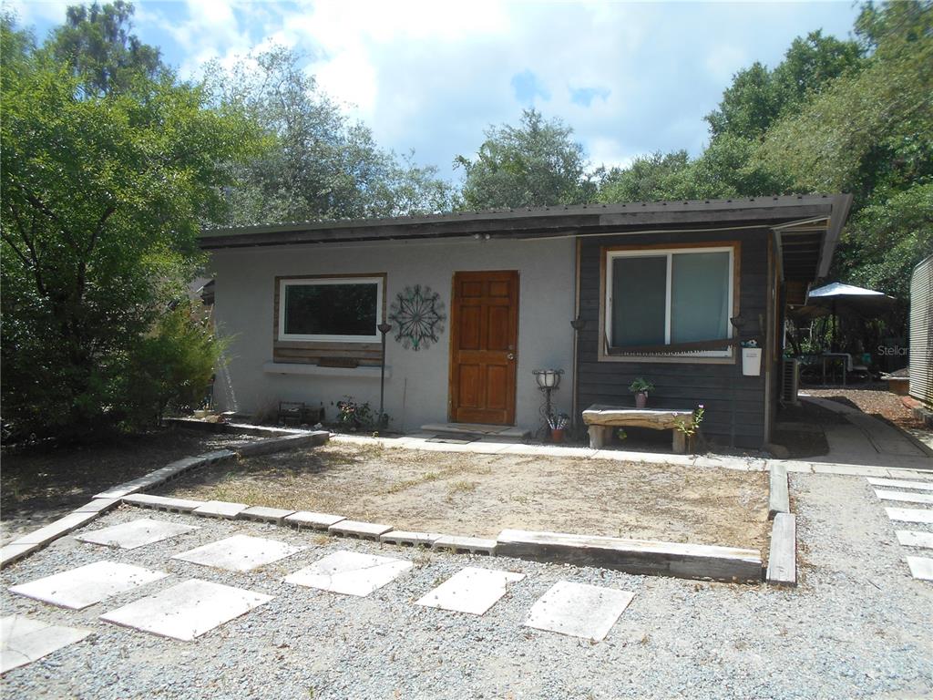 a view of a house with a patio