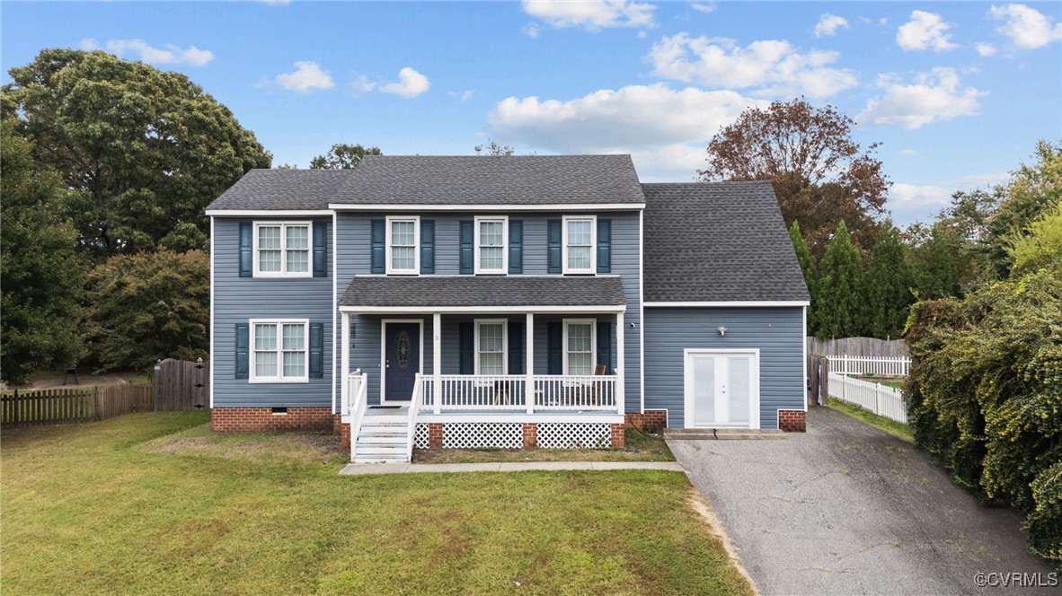 front view of a house with a yard