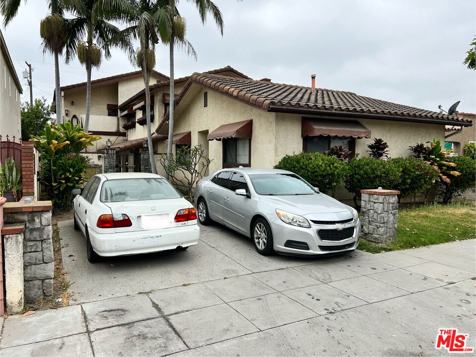 a car parked in front of a house