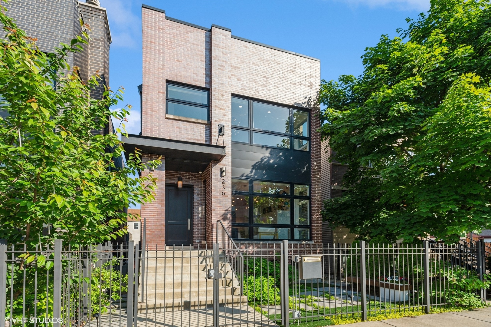 a house view with a garden space