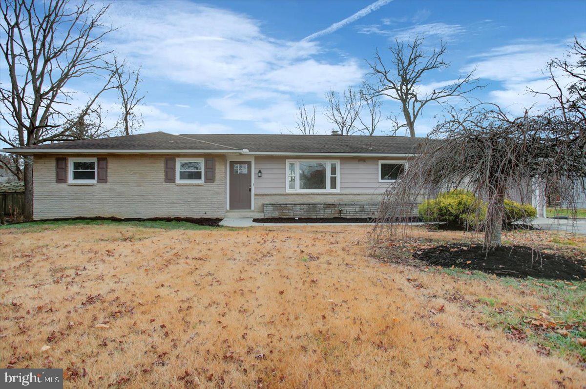 front view of house with a yard