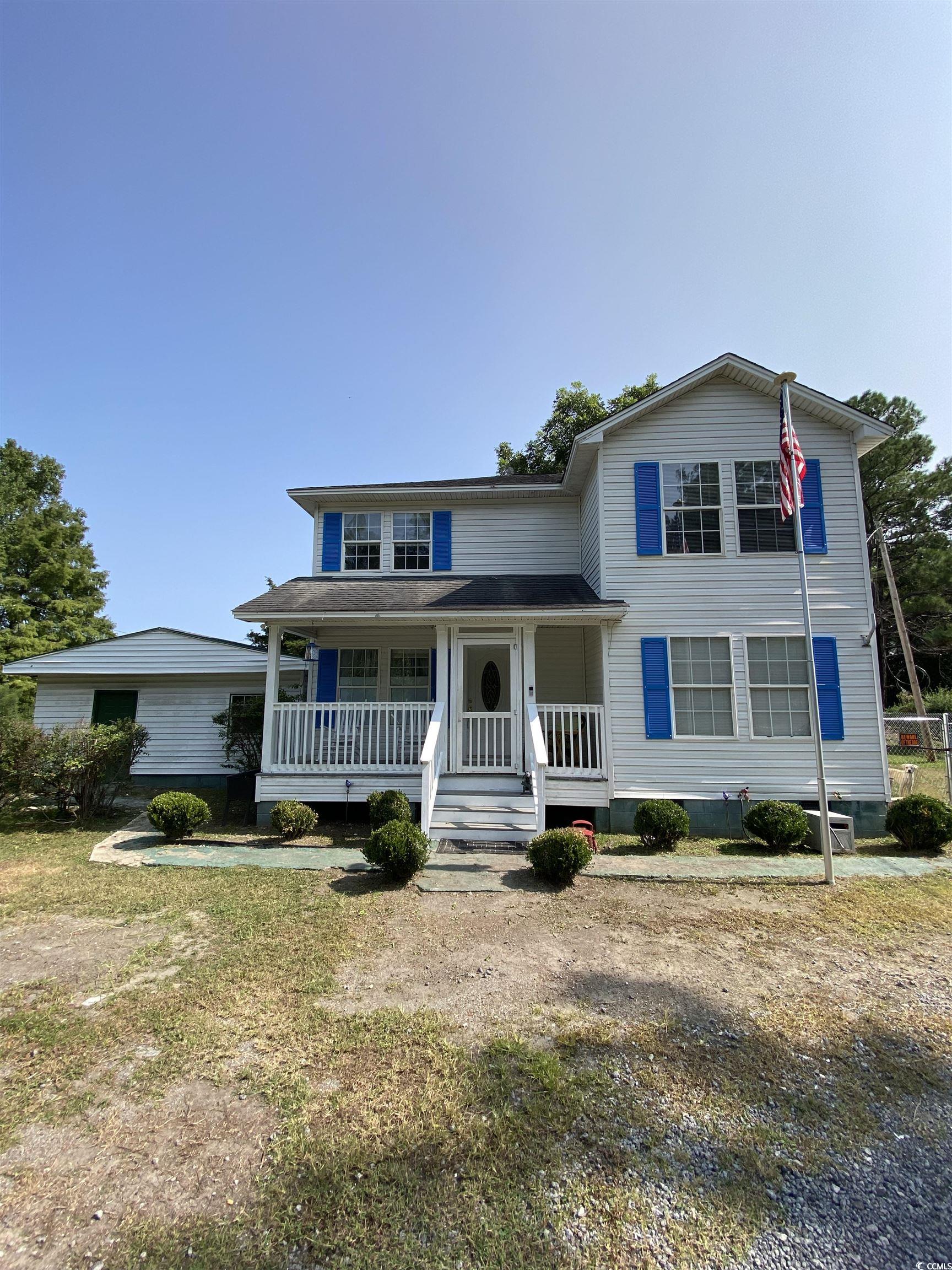 View of front facade with covered porch