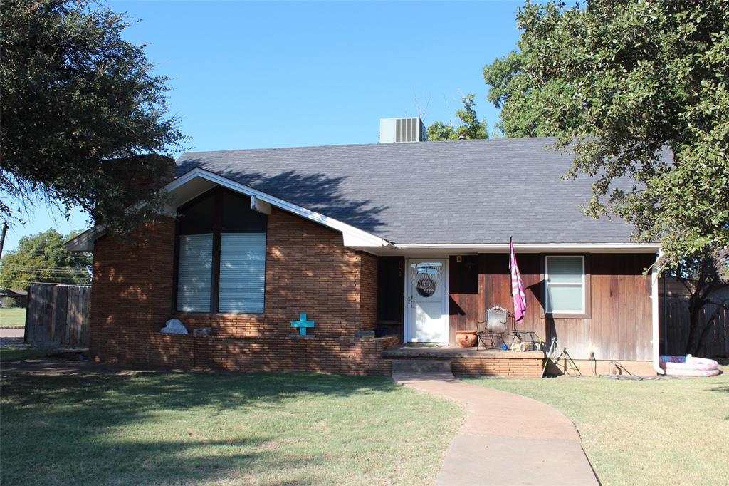 front view of a house with a patio