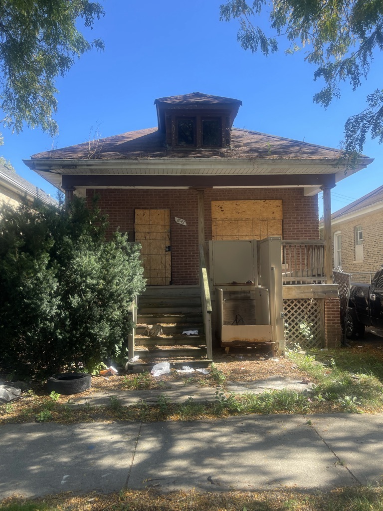 a view of a house with a patio