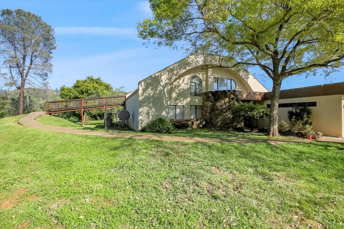 a backyard of a house with lots of green space