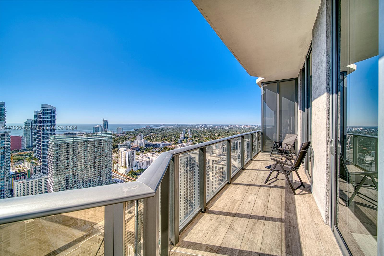 a view of balcony with furniture