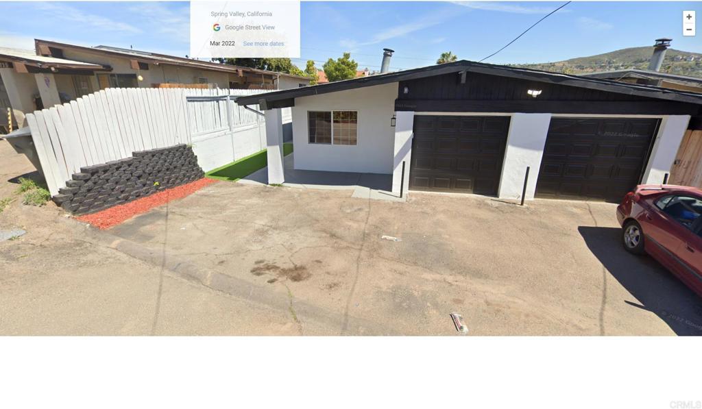 a view of a backyard of a house