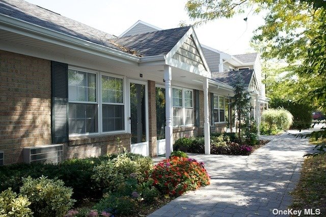 a view of a house with a garden