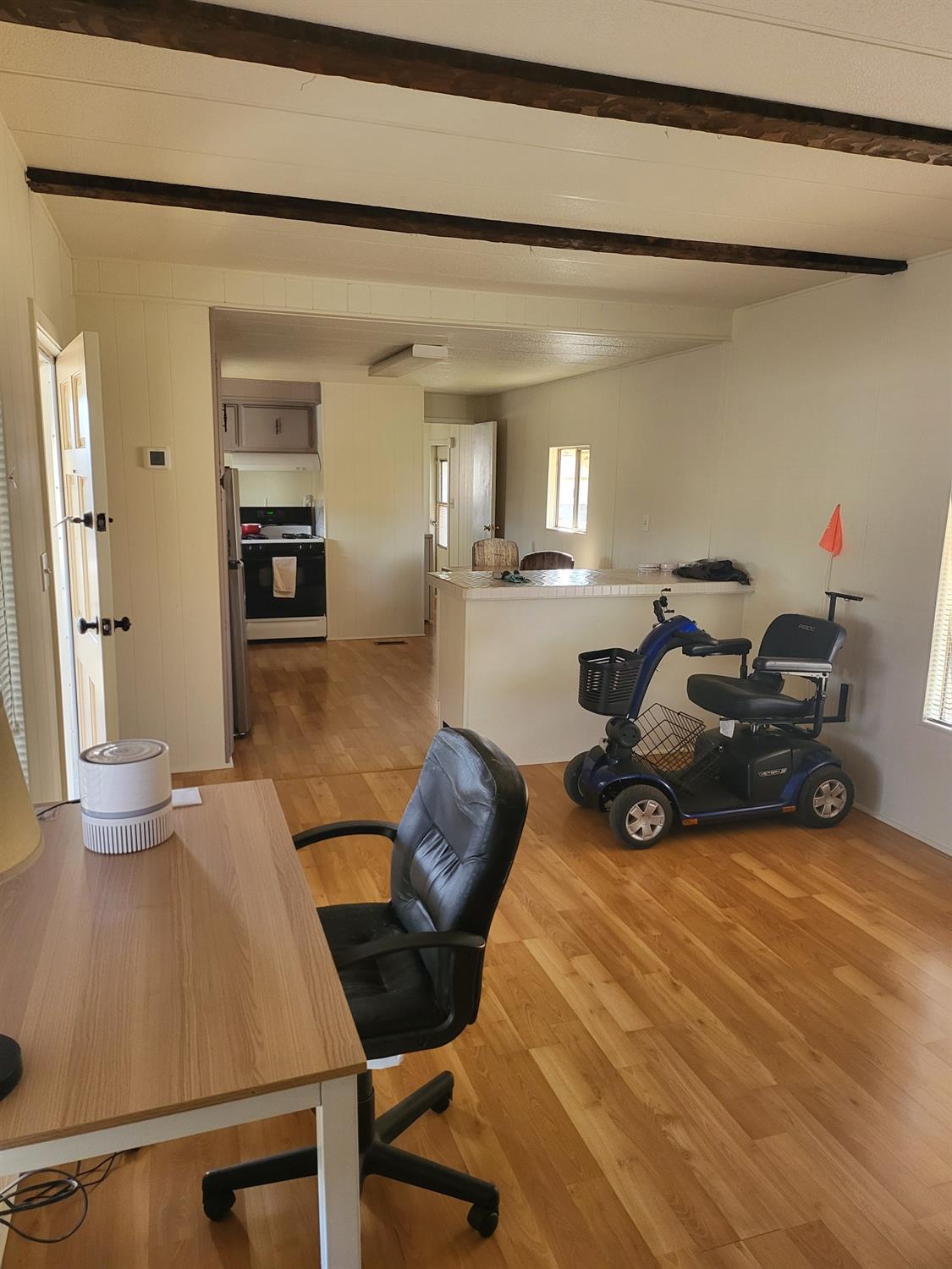 a living room with furniture and a table