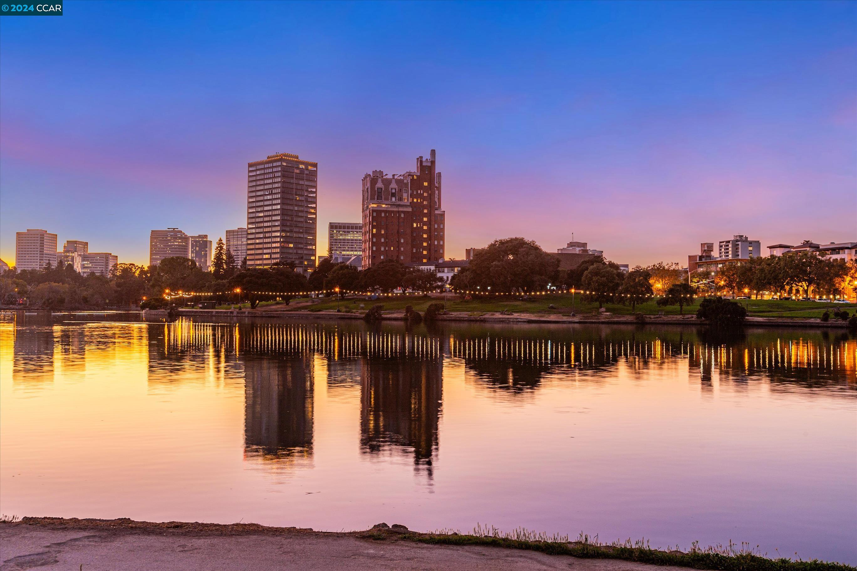 a view of a city with a lake