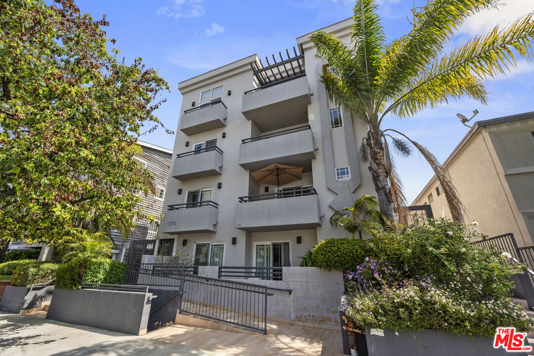 a front view of a multi story residential apartment buildings