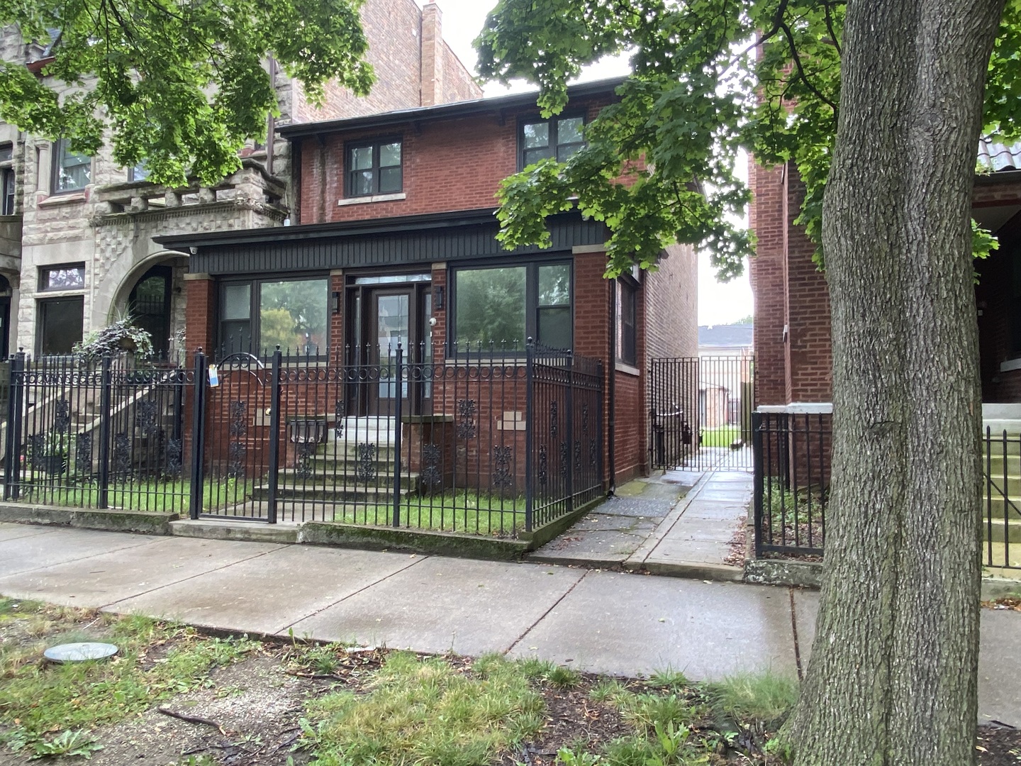 a front view of a house with a porch